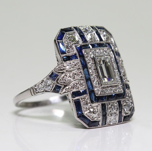 Vintage ring in polished silver and blue zirconia