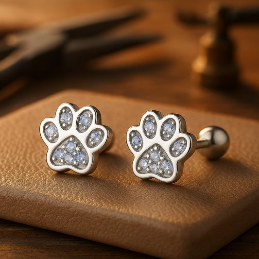 Button earrings with paw print in silver