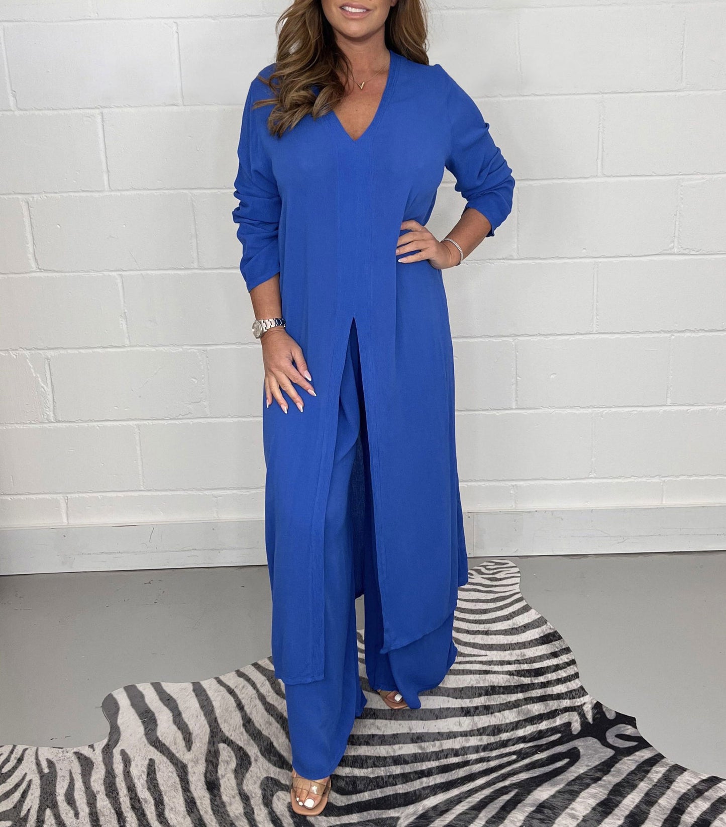 Global Allure: V-Neck Split Luxe Top & Tailored Trousers