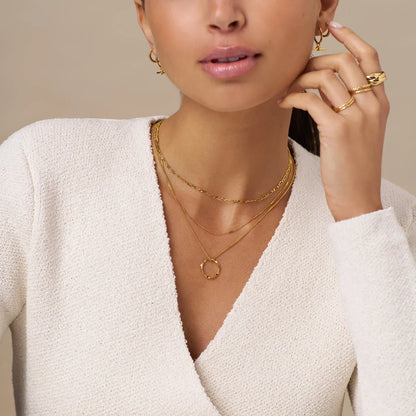 Three-row necklace with open circle